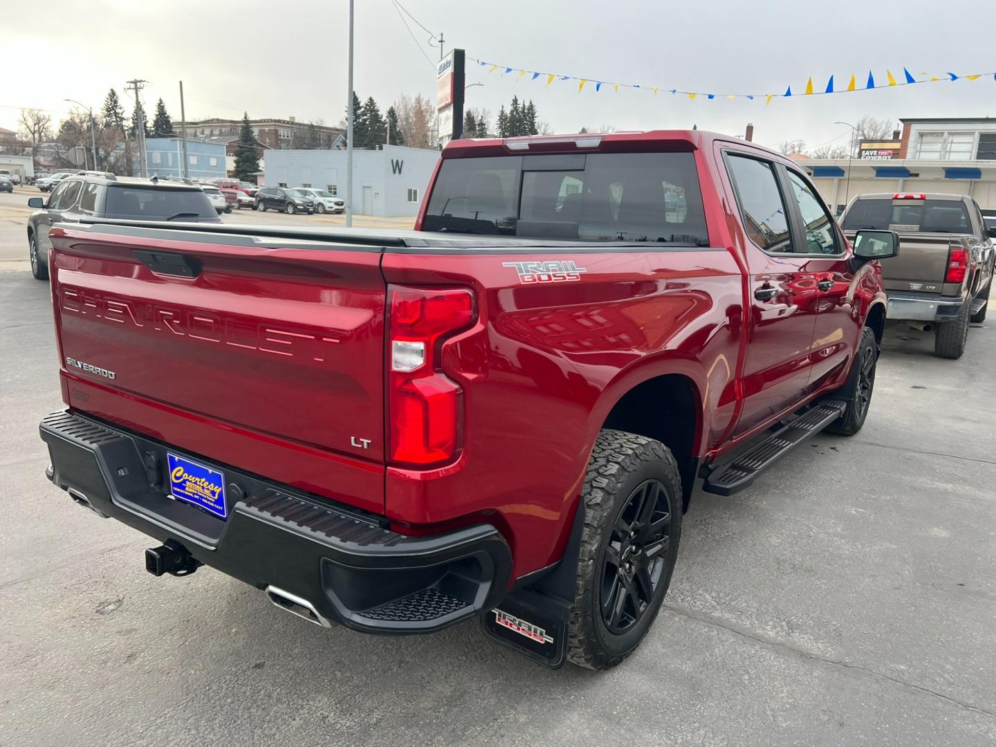 2021 Maroon /Charcoal Chevrolet Silverado 1500 Trail Boss (1GCPYFEL5MZ) with an 6.2L DI V8 engine, automatic transmission, located at 116 5th Avenue South, Lewistown, MT, 59457, 47.063877, -109.427879 - Explore the Rugged Elegance of Our Pre-Owned 2021 Chevrolet Silverado 1500 Crew Cab Trail Boss with a Mighty 6.2L Engine! Unleash the power of the open road with our exceptional 2021 Chevrolet Silverado 1500 Crew Cab Trail Boss. This pre-owned gem is equipped with a formidable 6.2L engine, delive - Photo#2